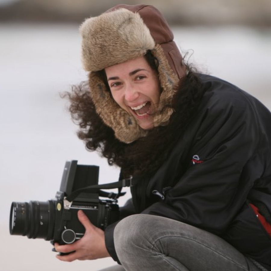 Melanie Challenger with a large-format camera at Volunteer Point.