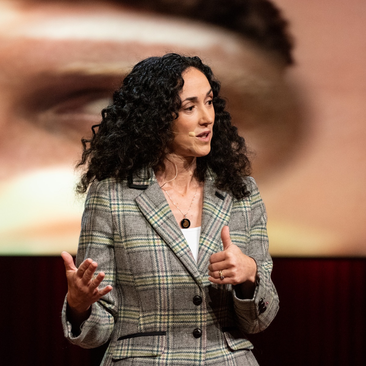 Melanie Challenger speaking on stage at Omroep HUMAN