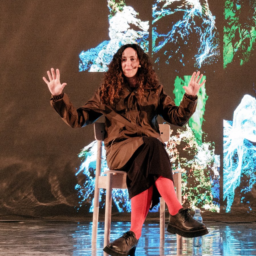 Melanie Challenger speaking on stage
